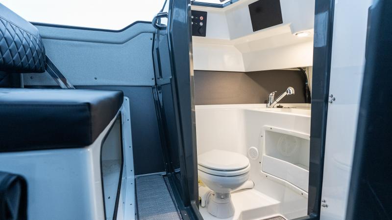 Buster Phantom Cabin has toilet with L-shaped door